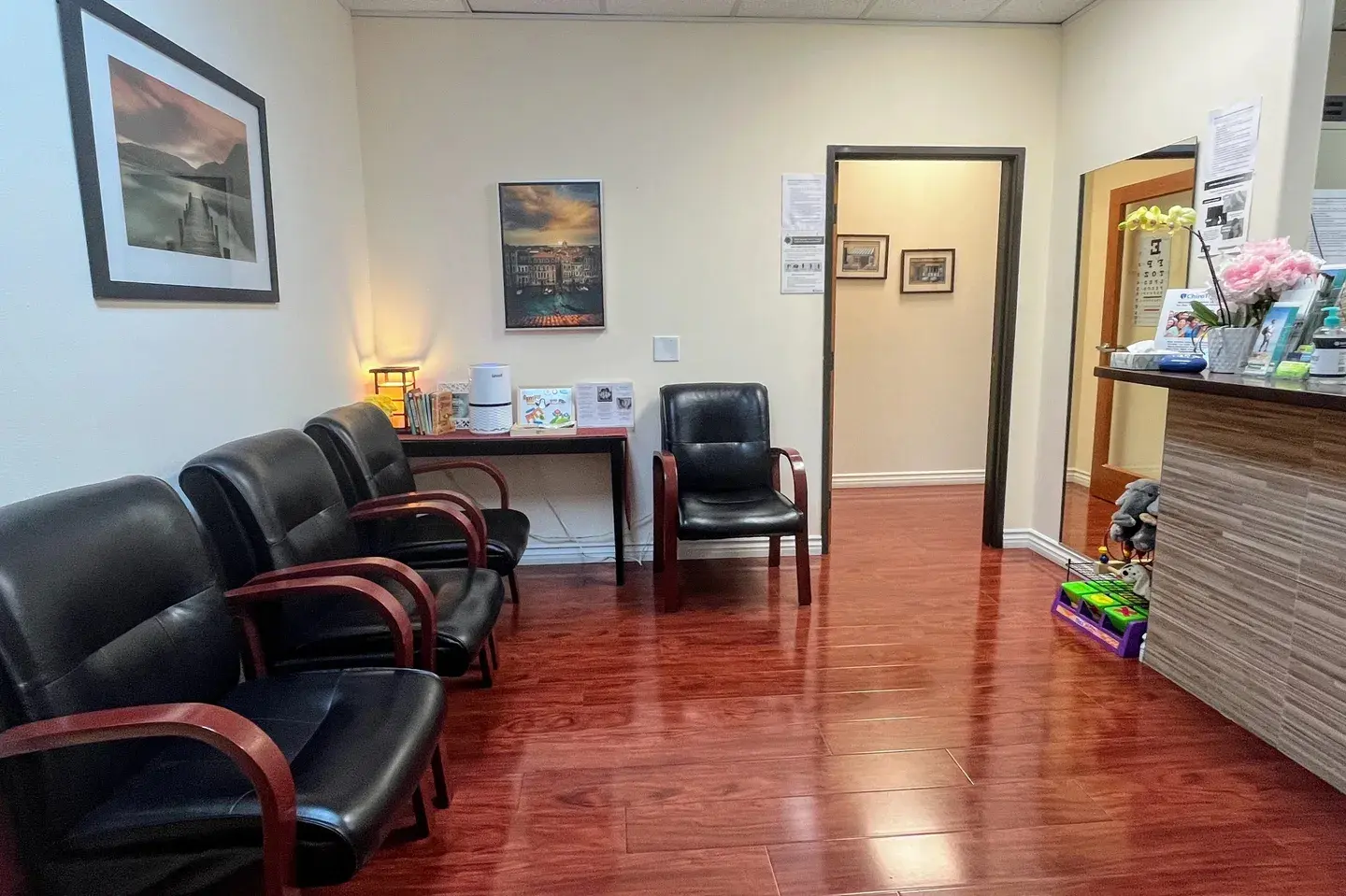 A room with chairs and a table in it